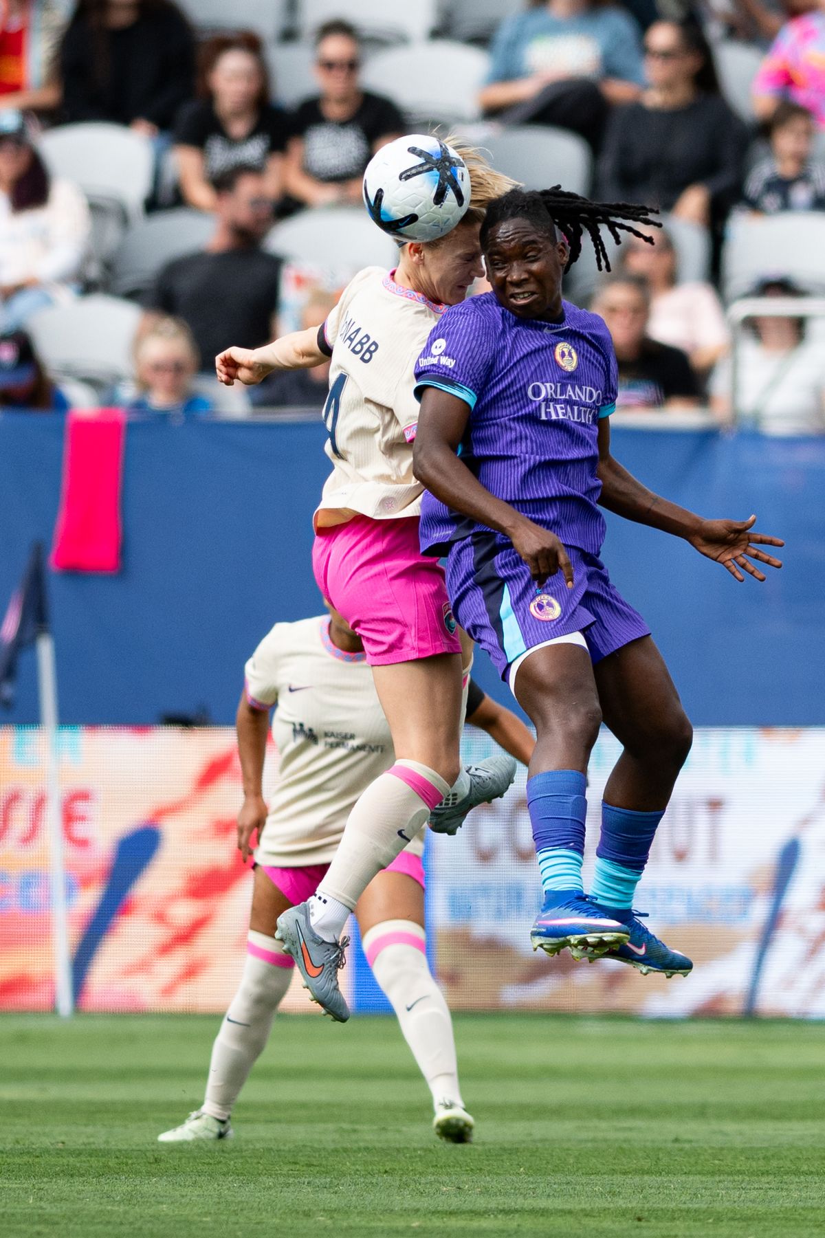 San Diego Wave defender Kristen McNabb (14) heads the ball away from Orlando Pride SC forward Barbra Banda (11) during an NWSL match between Orlando Pride SC and San Diego Wave FC on Sunday, May 24, 2026 at Snapdragon Stadium in San Diego Calif. San Diego Wave defender Kristen McNabb (14) heads the ball away from Orlando Pride SC forward Barbra Banda (11) during an NWSL match between Orlando Pride SC and San Diego Wave FC on Sunday, May 24, 2026 at Snapdragon Stadium in San Diego Calif.