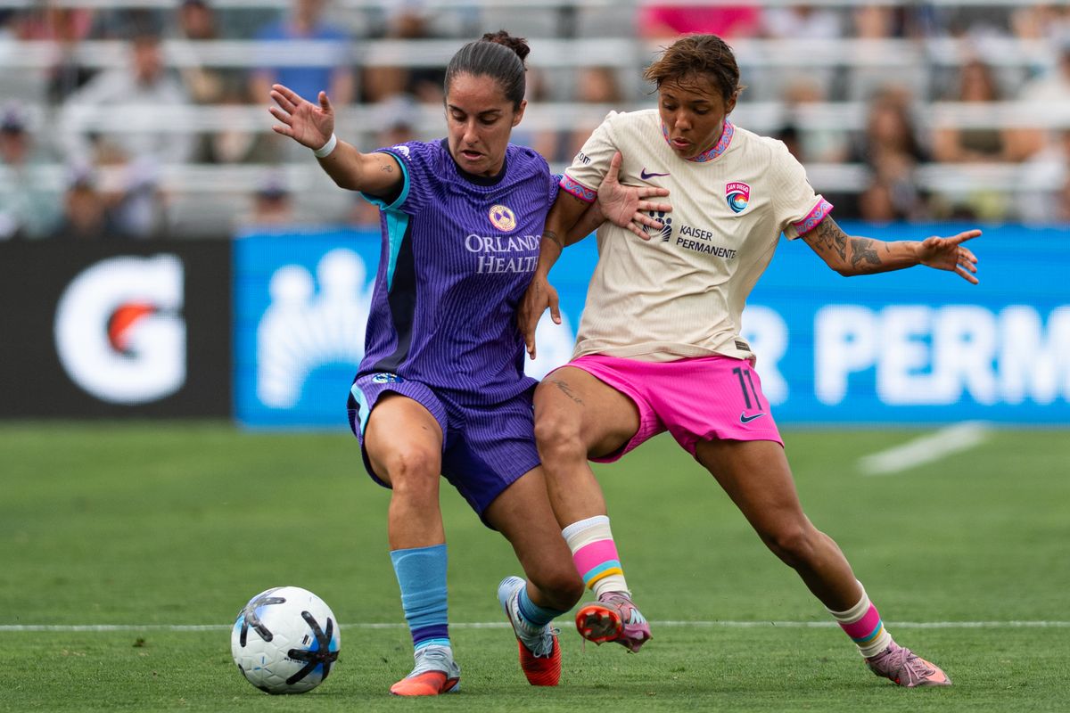 San Diego Wave midfielder Gia Corley (11) fights for possession during an NWSL match between Orlando Pride SC and San Diego Wave FC on Sunday, May 24, 2026 at Snapdragon Stadium in San Diego Calif. San Diego Wave midfielder Gia Corley (11) fights for possession during an NWSL match between Orlando Pride SC and San Diego Wave FC on Sunday, May 24, 2026 at Snapdragon Stadium in San Diego Calif.