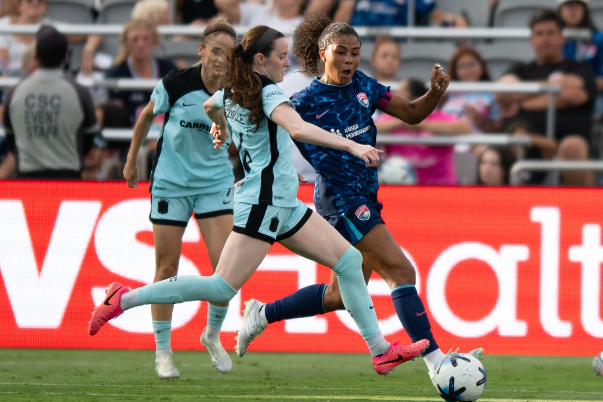 San Diego Wave defender Kennedy Wesley (2) puts pressure defense on Gotham FC midfielder Rose Lavelle (16) during an NWSL match between Gotham FC and San Diego Wave on Saturday, July 4, 2026 at Snapdragon Stadium in San Diego California San Diego Wave defender Kennedy Wesley (2) puts pressure defense on Gotham FC midfielder Rose Lavelle (16) during an NWSL match between Gotham FC and San Diego Wave on Saturday, July 4, 2026 at Snapdragon Stadium in San Diego California