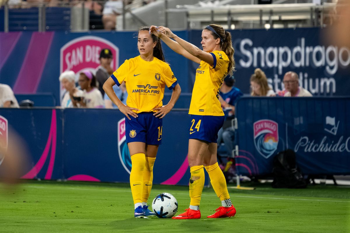 Utah Royals FC strikers Nuria Rábano (14) and Cloé Lacasse (24) set up a free kick during an NWSL soccer game against San Diego Wave FC, Friday, August 21, 2026 in San Diego, California.
