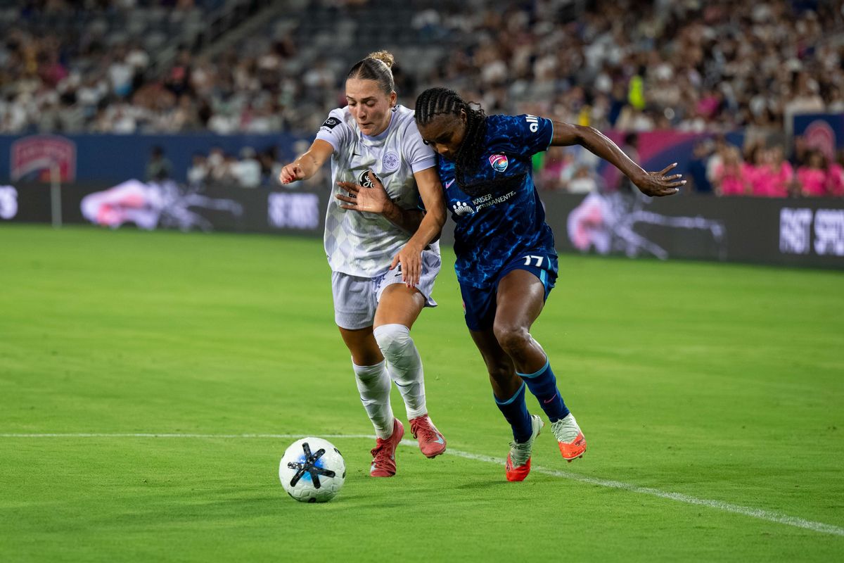 San Diego Wave FC forward Ludmila fights for the ball against Racing Louisville defender Quincy McMahon during an NWSL soccer game, Friday, August 28, 2026 in San Diego, California San Diego Wave FC forward Ludmila fights for the ball against Racing Louisville defender Quincy McMahon during an NWSL soccer game, Friday, August 28, 2026 in San Diego, California
