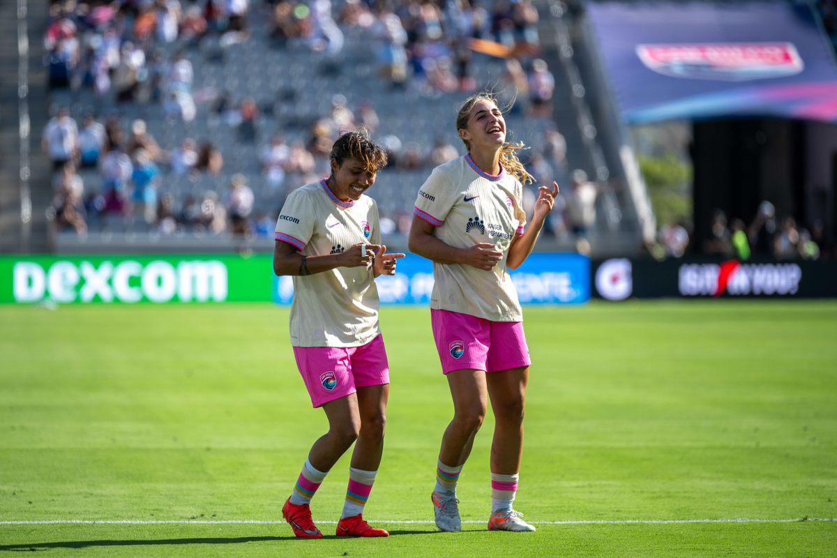 San Diego Wave FC midfielder Gia Corley (left) celebrates her goal with teammate Kimmi Ascanio during an NWSL soccer game against NC Courage, Saturday, September 12, 2026 in San Diego, California.