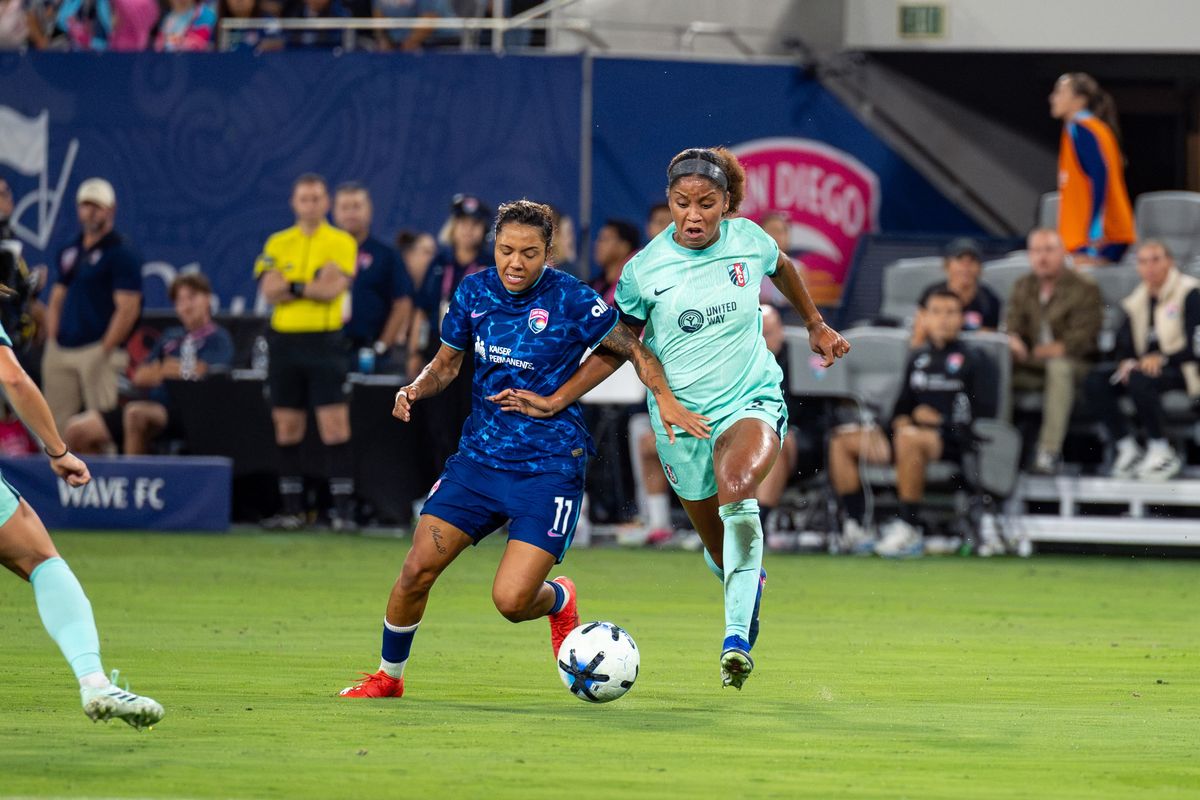 San Diego Wave FC midfielder Gia Corley fights for the ball against KC Current defender Elizabeth Ball during an NWSL soccer game, Friday, September 18, 2026 in San Diego, California. San Diego Wave FC midfielder Gia Corley fights for the ball against KC Current defender Elizabeth Ball during an NWSL soccer game, Friday, September 18, 2026 in San Diego, California.