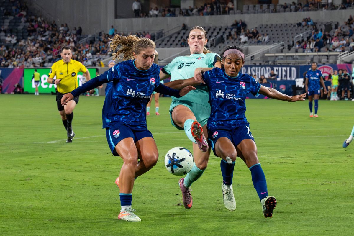 San Diego Wave FC midfielder Kimmi Ascanio (left) and defender Perle Morroni (right) shield the ball during an NWSL soccer game against KC Current, Friday, September 18, 2026 in San Diego, California. San Diego Wave FC midfielder Kimmi Ascanio (left) and defender Perle Morroni (right) shield the ball during an NWSL soccer game against KC Current, Friday, September 18, 2026 in San Diego, California.