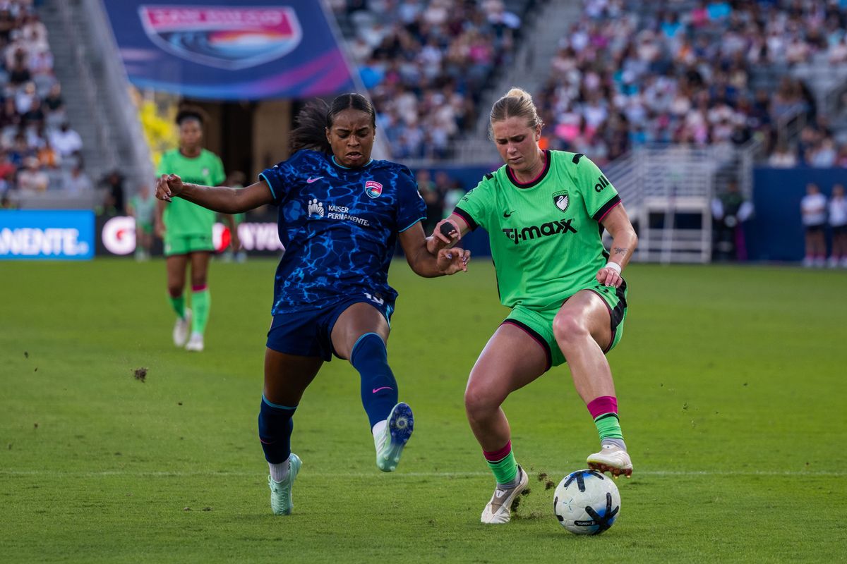 San Diego Wave FC forward Trinity Byars fights for the ball against Boston Legacy midfielder Annie Karich during an NWSL soccer game, Sunday, October 25, 2026 in San Diego, California.