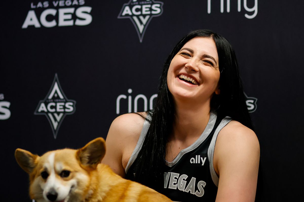 Las Vegas Aces center Megan Gustafson (17) has a laugh while speaking to the media during the Aces’ media day, Thursday May 8, 2025 in Las Vegas, Nev.
