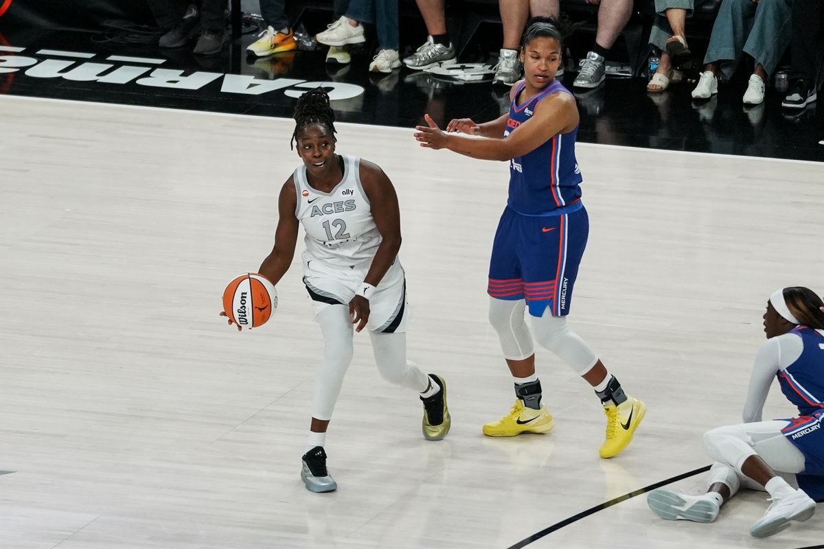 Las Vegas Aces guard Chelsea Gray (12) eyes the court during first half of WNBA game against Phoenix Mercury on Saturday May 9, 2026 at T-Mobile Arena in Las Vegas. Las Vegas Aces guard Chelsea Gray (12) eyes the court during first half of WNBA game against Phoenix Mercury on Saturday May 9, 2026 at T-Mobile Arena in Las Vegas.