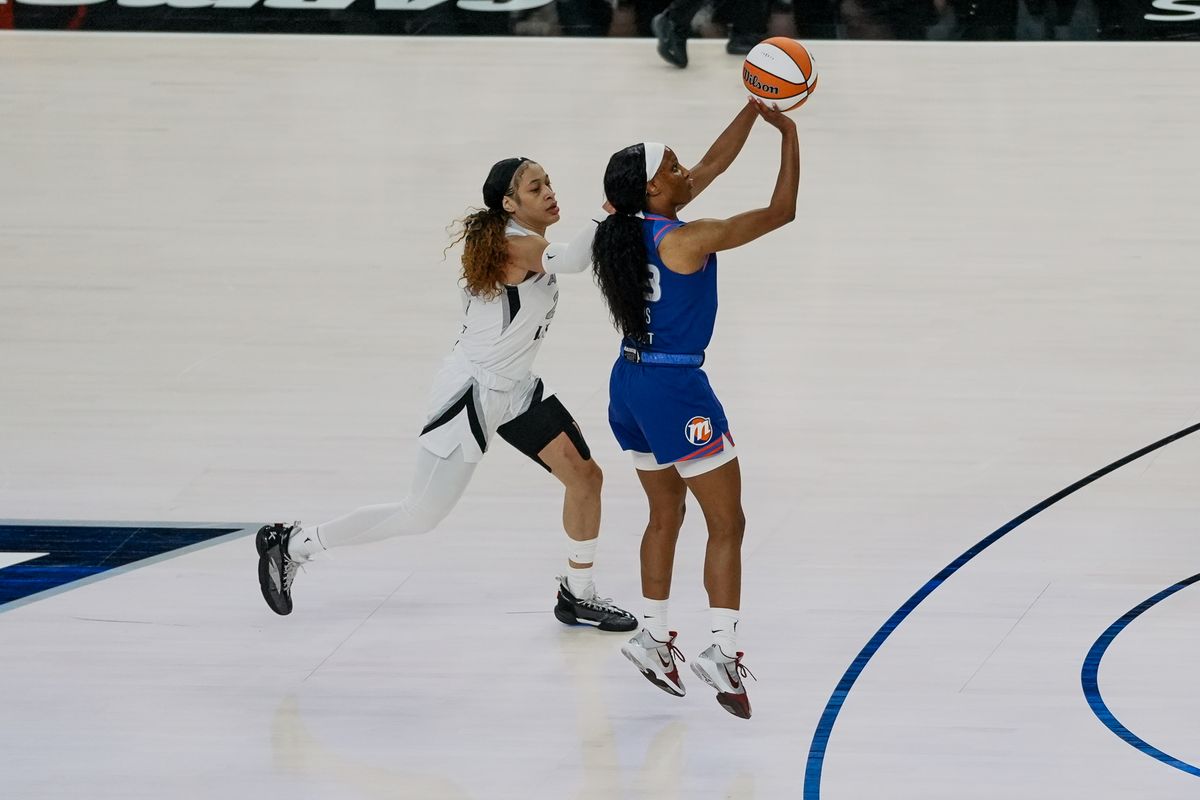 Phoenix Mercury guard Kiana Williams (23) attempts to shoot the ball while guarded by Aces guard Chennedy Carter (23) during WNBA game against Aces on Saturday May 9, 2026 at T-Mobile Arena in Las Vegas. Phoenix Mercury guard Kiana Williams (23) attempts to shoot the ball while guarded by Aces guard Chennedy Carter (23) during WNBA game against Aces on Saturday May 9, 2026 at T-Mobile Arena in Las Vegas.