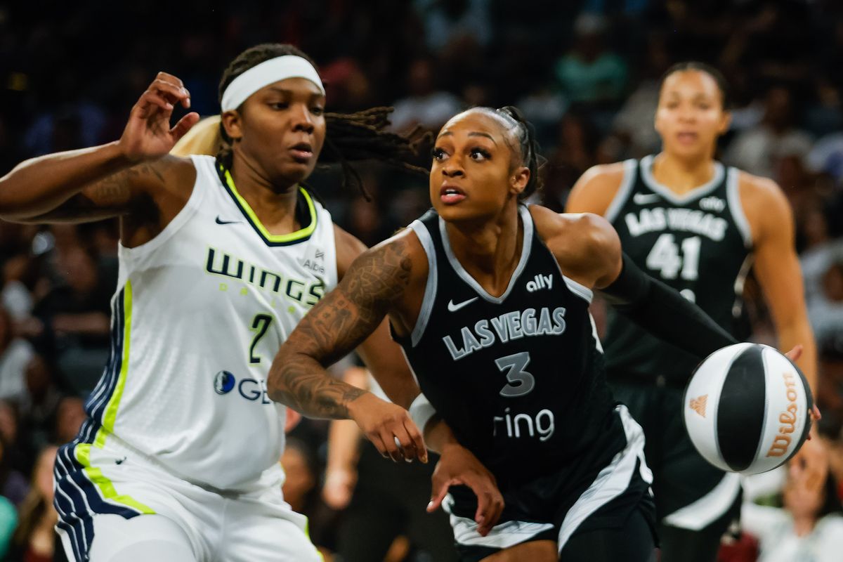  Las Vegas Aces guard Tiffany Mitchell (3) drives to the basket while Dallas Wings forward Myisha Hines-Allen (2) defends during a WNBA game between the Las Vegas Aces and the Dallas Wings, Friday June 13, 2025 in Las Vegas, Nev.