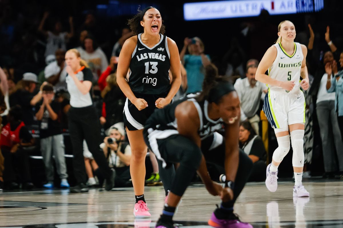 Las Vegas Aces guard/forward Aaliyah Nye (13) and guard Chelsea Gray (12) yell in celebration after the Aces score to take the lead in the fourth quarter during a WNBA game between the Las Vegas Aces and the Dallas Wings, Friday June 13, 2025 in Las Vegas, Nev.