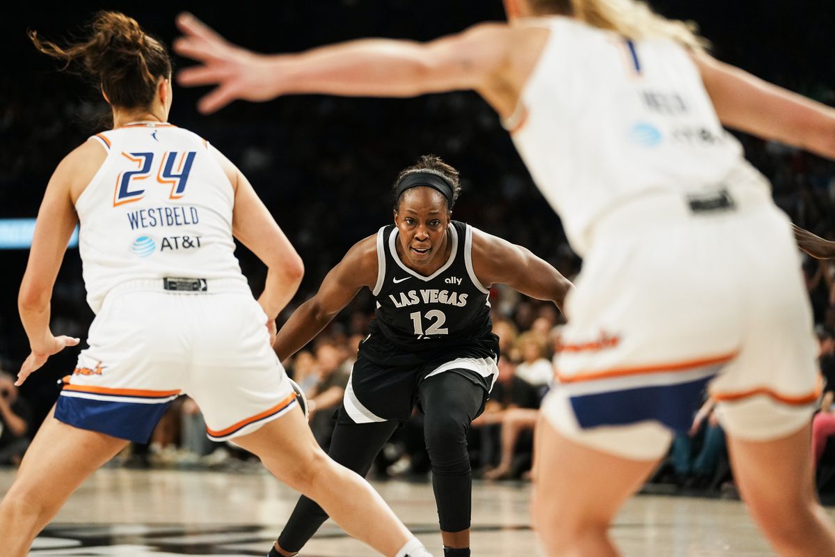 Las Vegas Aces guard Chelsea Gray (12) prepares to drives towards the basket during WNBA game against Pheonix Mercury on Sunday June 15, 2025 in Las Vegas.  