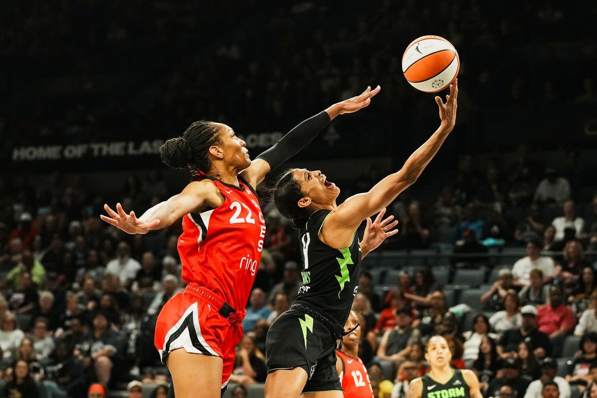 Las Vegas Aces center A’ja Wilson (22) attempts to block a shot from Seattle Storm guard Skylar Diggins (4) during WNBA game against Seattle Storm on Friday June 20 2025 in Las Vegas.  