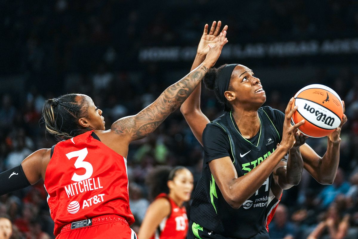 Seattle Storm center Dominique Malonga (14) eyes the basket while guarded by Las Vegas Aces guard Tiffany Mitchell (3) during WNBA game against Las Vegas Aces on Friday June 20, 2025 in Las Vegas.