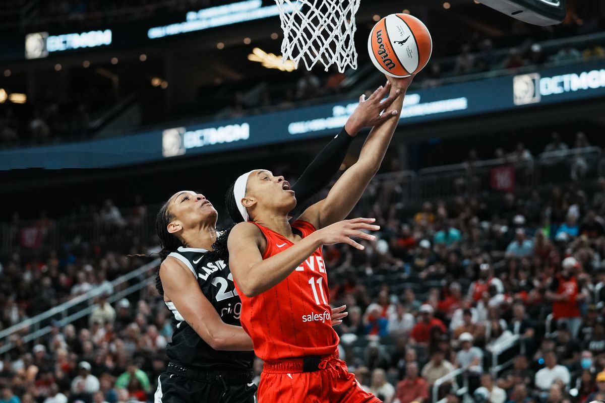 Indiana Fever forward Brianna Turner (11)  attempts a layup while guarded by Las Vegas Aces center A’ja Wilson during WNBA game against Las Vegas Aces on Sunday June 22, 2025 in Las Vegas.