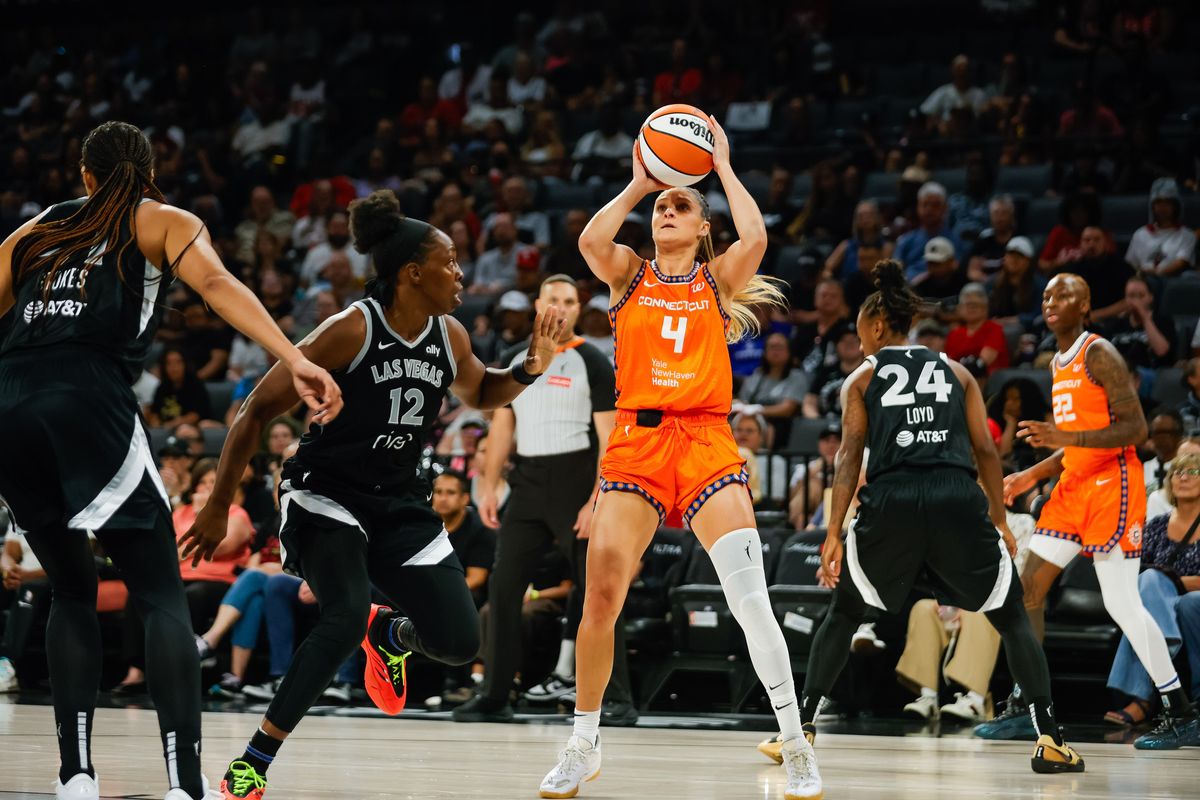 Connecticut Sun guard Jacy Sheldon (4) shoots a baseline jumpshot during a WNBA game between the Las Vegas Aces and the Connecticut Sun, Wednesday June 25, 2025 in Las Vegas, Nev.