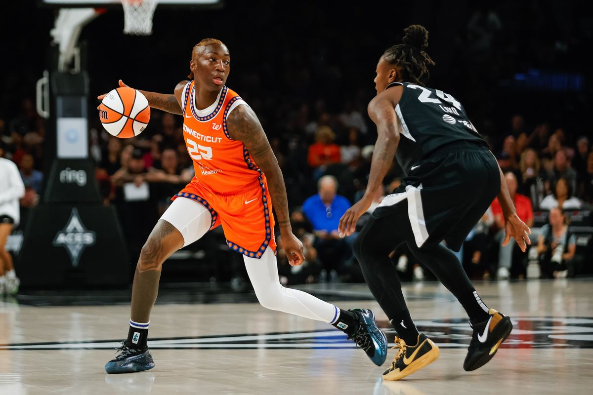 Connecticut Sun guard Saniya Rivers (22) scans the court while dribbling the ball during a WNBA game between the Las Vegas Aces and the Connecticut Sun, Wednesday June 25, 2025 in Las Vegas, Nev.