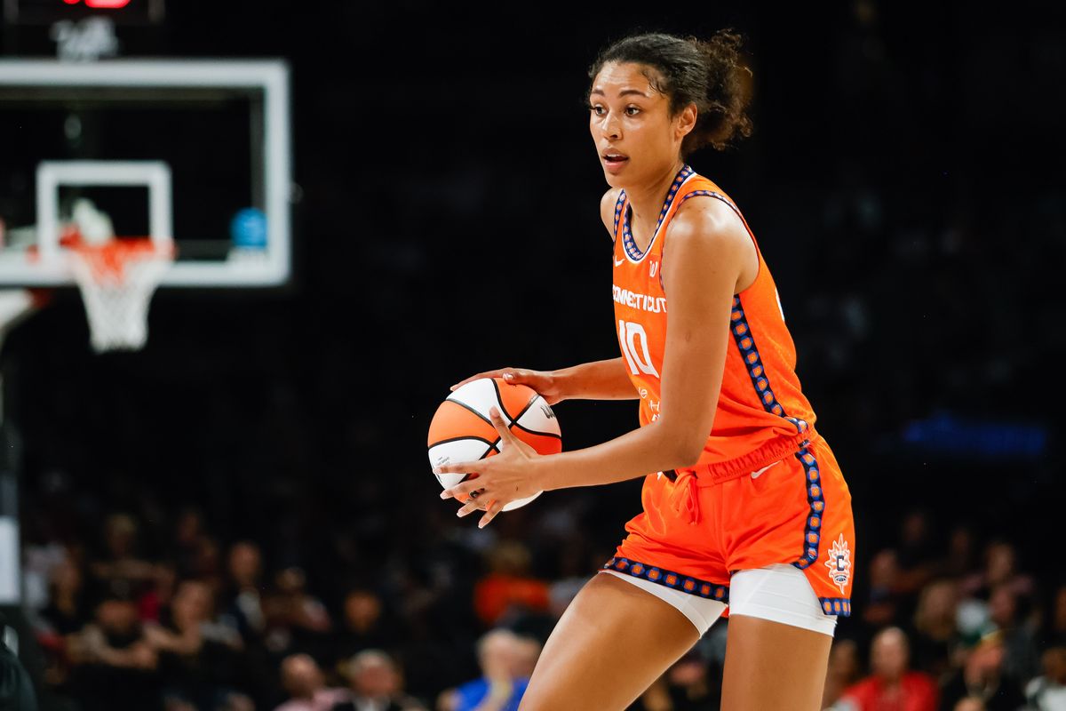 Connecticut Sun center Olivia Nelson-Ododa (10) looks for a teammate to pass the ball to during a WNBA game between the Las Vegas Aces and the Connecticut Sun, Wednesday June 25, 2025 in Las Vegas, Nev.