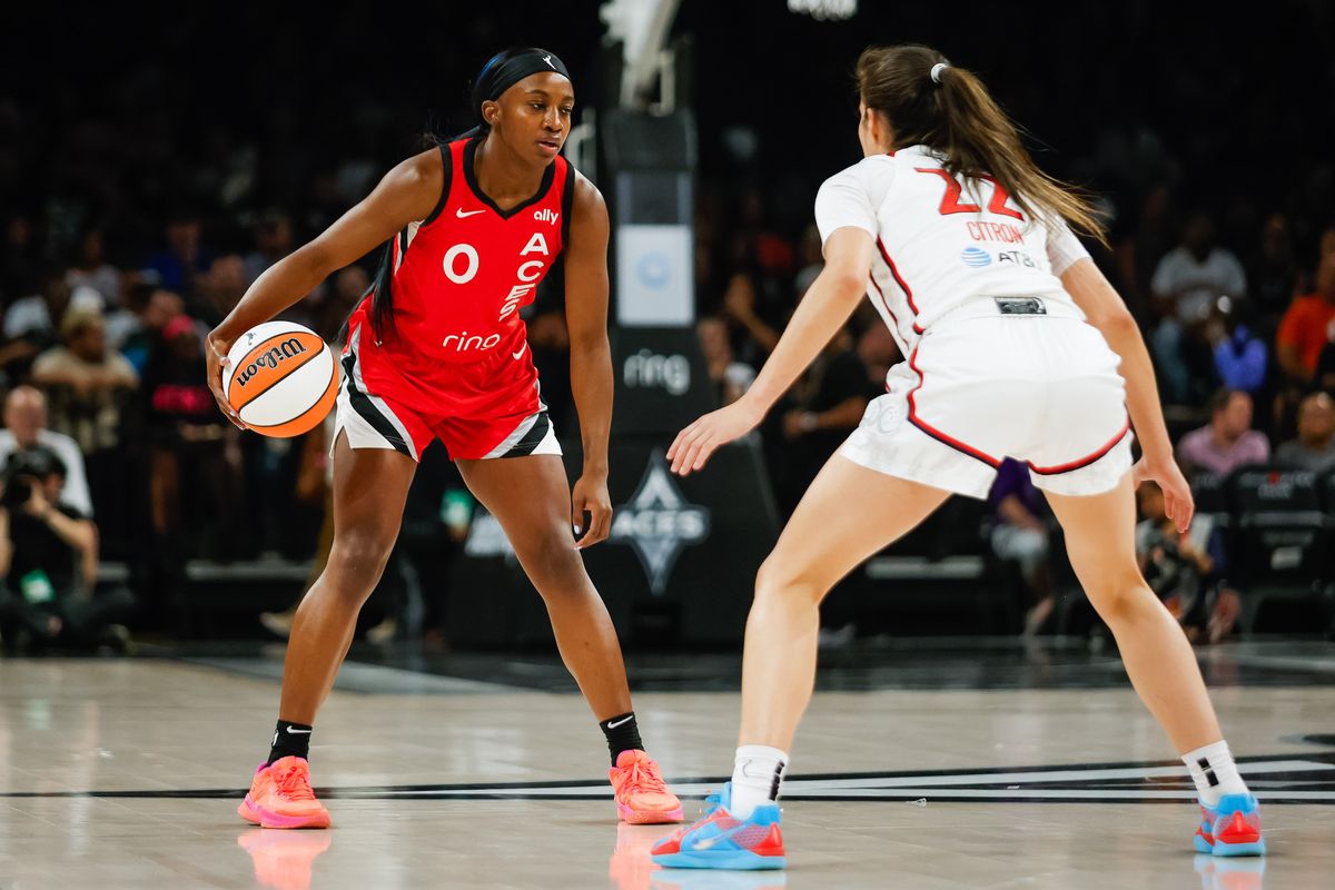 Las Vegas Aces guard Jackie Young (0) dribbles the ball as Washington Mystics guard Sonia Citron (22) defends her during a WNBA game between the Las Vegas Aces and the Washington Mystics, Thursday June 26, 2025 in Las Vegas, Nev.
