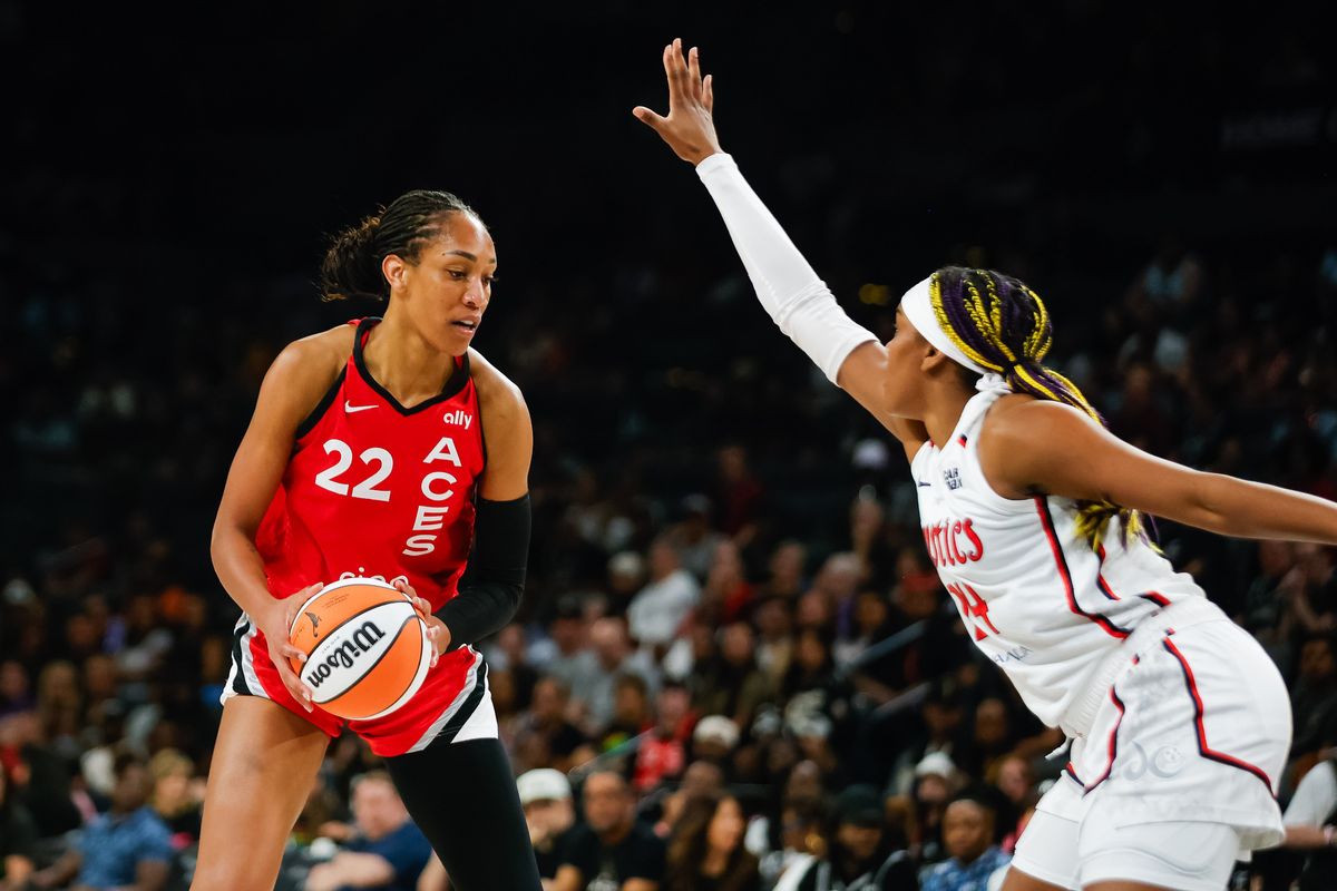 Las Vegas Aces forward A’ja Wilson (22) looks to make a move to the basket as Washington Mystics forward Aaliyah Edwards (24) defends her during a WNBA game between the Las Vegas Aces and the Washington Mystics, Thursday June 26, 2025 in Las Vegas, Nev.