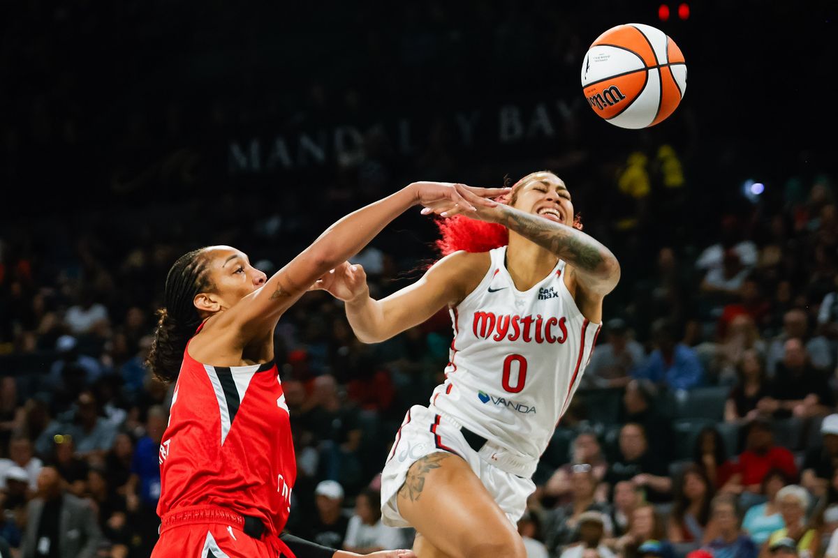  Las Vegas Aces forward A’ja Wilson (22) blocks the shot of Washington Mystics forward Shakira Austin (0) during a WNBA game between the Las Vegas Aces and the Washington Mystics, Thursday June 26, 2025 in Las Vegas, Nev.