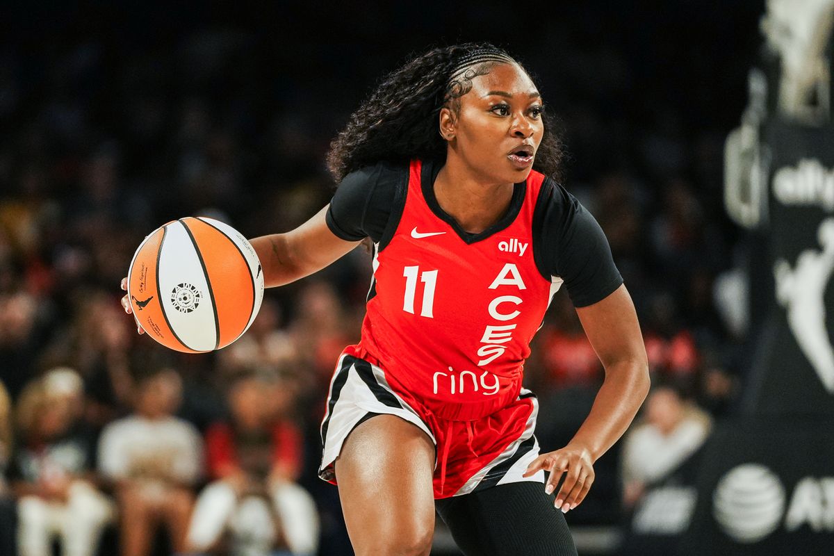 Las Vegas Aces guard Dana Evans (11) takes the ball down the court during WNBA game against Atlanta Dream on Tuesday July 22 ,2025 in Las Vegas.  