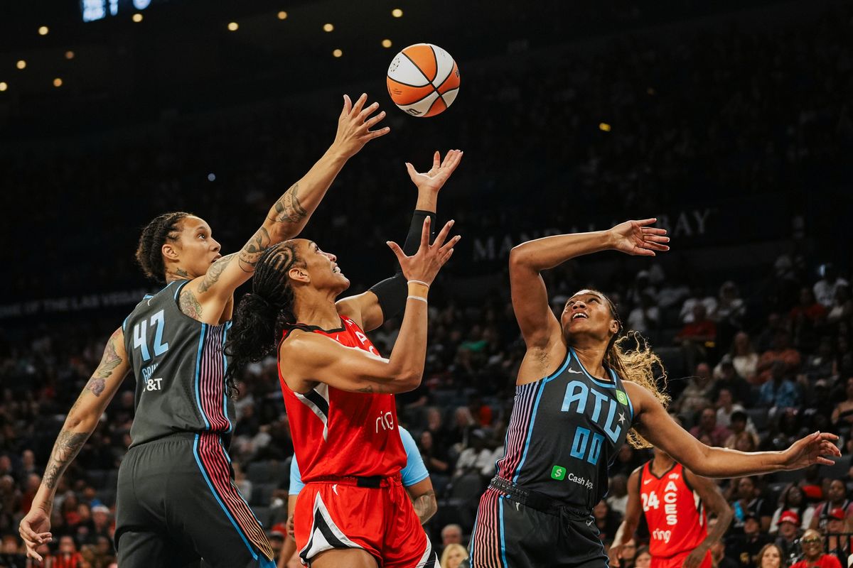 Las Vegas Aces center A’ja Wilson (22), Atlanta Dream Brittney Griner (42) and forward Naz Hilmon (0) reach for a layup during WNBA game against Atlanta Dream on Tuesday July 22 ,2025 in Las Vegas.  