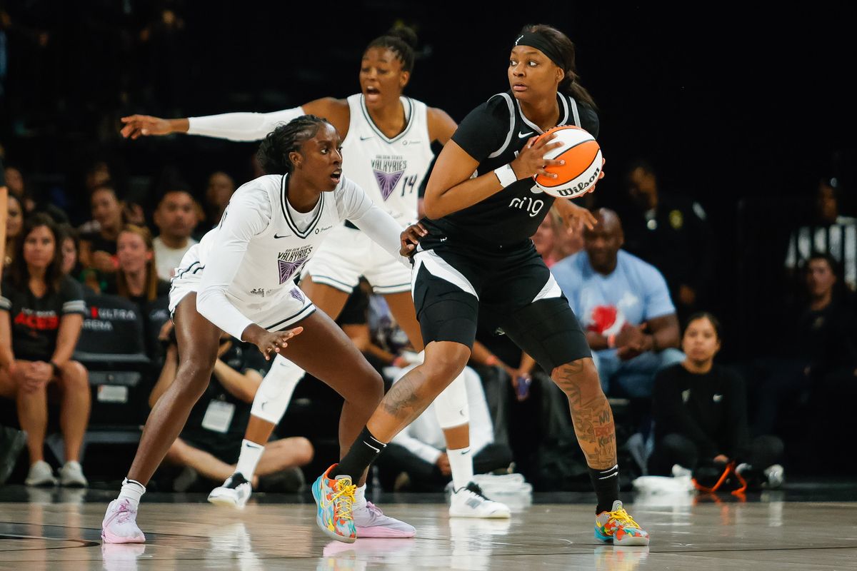 Las Vegas Aces forward NaLyssa Smith (3) backs down Golden State Valkyries forward Laeticia Amihere (3) during a WNBA game between the Las Vegas Aces and the Golden State Valkyries, Sunday August 3, 2025 in Las Vegas, Nev.