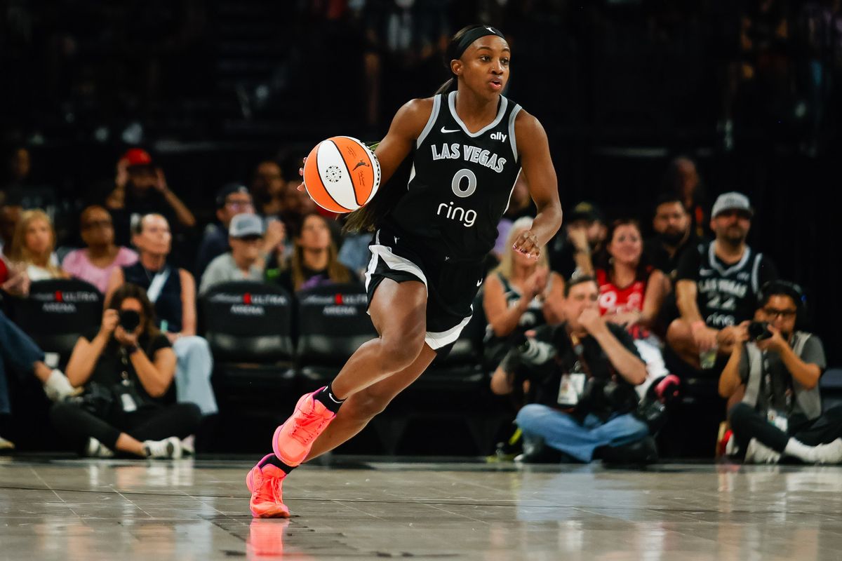 Las Vegas Aces guard Jackie Young (0) dribbles the ball up the court during a WNBA game between the Las Vegas Aces and the Golden State Valkyries, Sunday August 3, 2025 in Las Vegas, Nev.