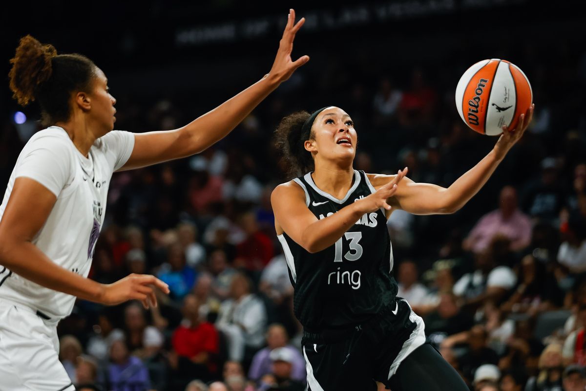 Las Vegas Aces guard Aaliyah Nye (13) goes for a lay-up during a WNBA game between the Las Vegas Aces and the Golden State Valkyries, Sunday August 3, 2025 in Las Vegas, Nev.