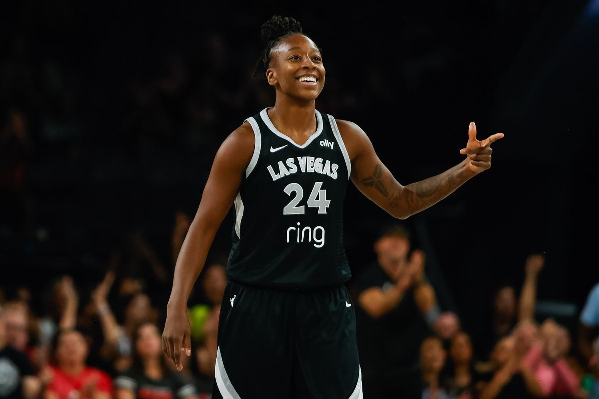 Las Vegas Aces guard Jewell Loyd (24) holds up three fingers after scoring a three-point shot during a WNBA game between the Las Vegas Aces and the Golden State Valkyries, Sunday August 3, 2025 in Las Vegas, Nev.