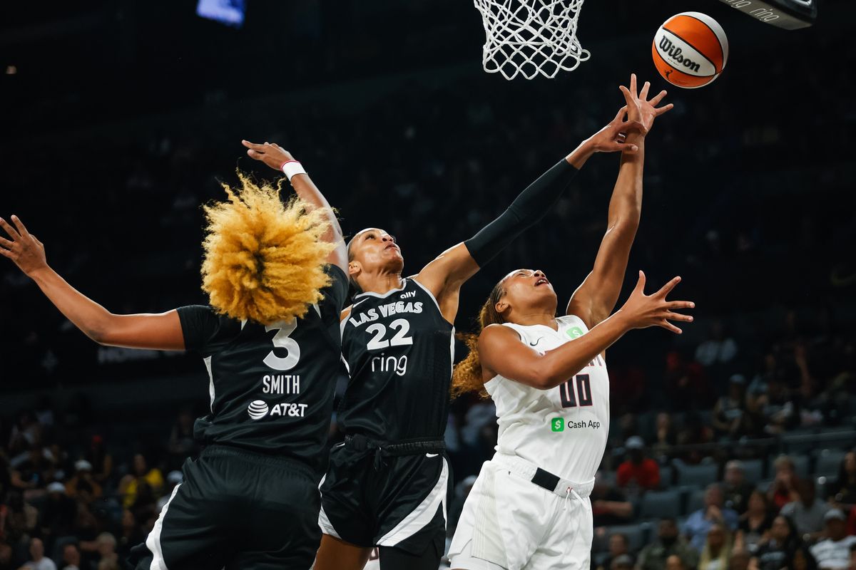 Las Vegas Aces forward A’ja Wilson (22) blocks the shot of Atlanta Dream forward Naz Hillmon (00) during a WNBA game between the Las Vegas Aces and the Atlanta Dream, Tuesday August 19, 2025 in Las Vegas, Nev. Las Vegas Aces forward A’ja Wilson (22) blocks the shot of Atlanta Dream forward Naz Hillmon (00) during a WNBA game between the Las Vegas Aces and the Atlanta Dream, Tuesday August 19, 2025 in Las Vegas, Nev.