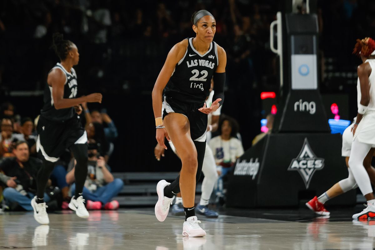 Las Vegas Aces forward A’ja Wilson (22) holds up three fingers as a celebration after making a three-point shot during a WNBA game between the Las Vegas Aces and the Atlanta Dream, Tuesday August 19, 2025 in Las Vegas, Nev. Las Vegas Aces forward A’ja Wilson (22) holds up three fingers as a celebration after making a three-point shot during a WNBA game between the Las Vegas Aces and the Atlanta Dream, Tuesday August 19, 2025 in Las Vegas, Nev.