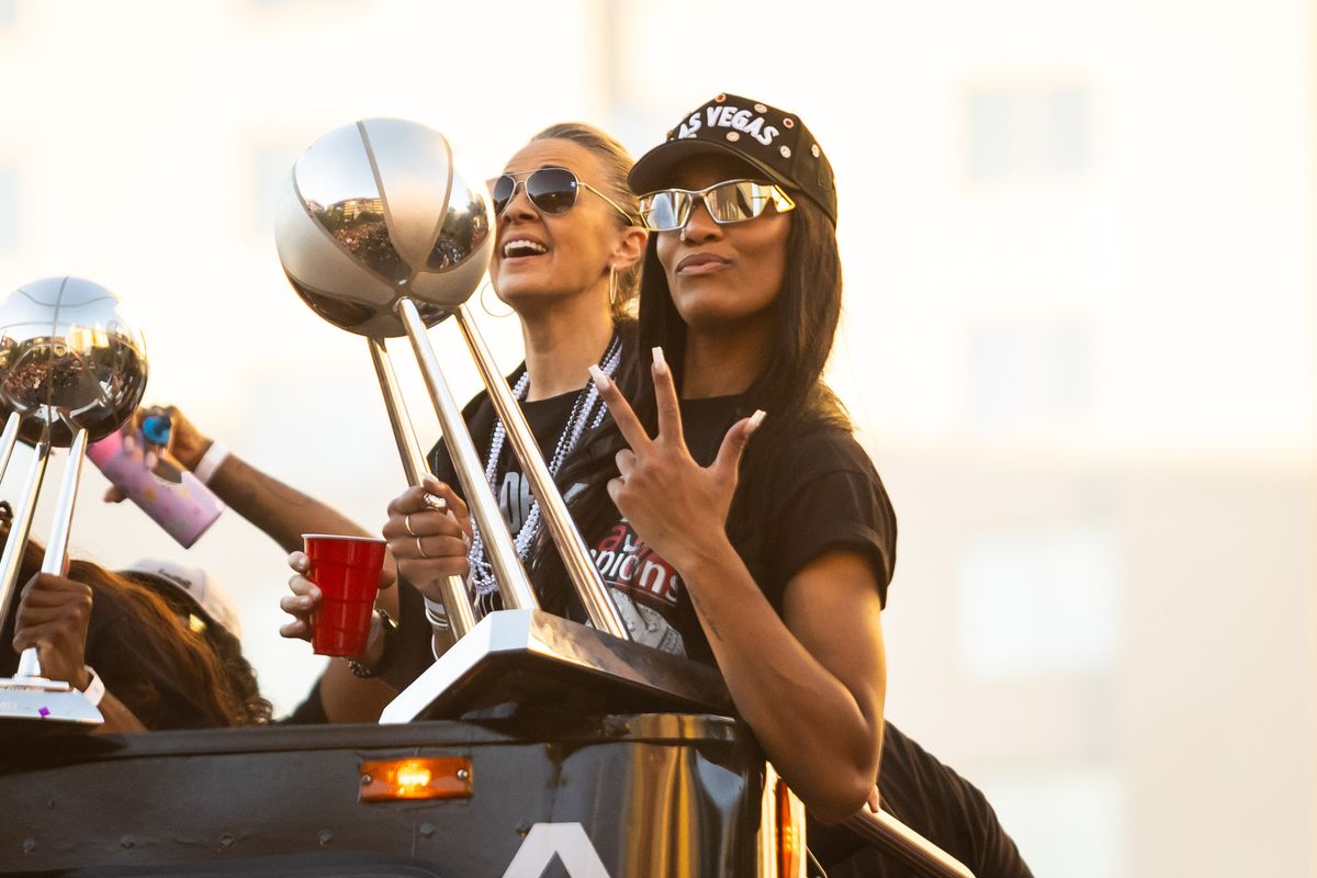 Las Vegas Aces forward A’ja Wilson poses with the Aces’ WNBA championship trophy during the Aces’ championship parade, Friday October 17, 2025 in Las Vegas, Nev. Las Vegas Aces forward A’ja Wilson poses with the Aces’ WNBA championship trophy during the Aces’ championship parade, Friday October 17, 2025 in Las Vegas, Nev.