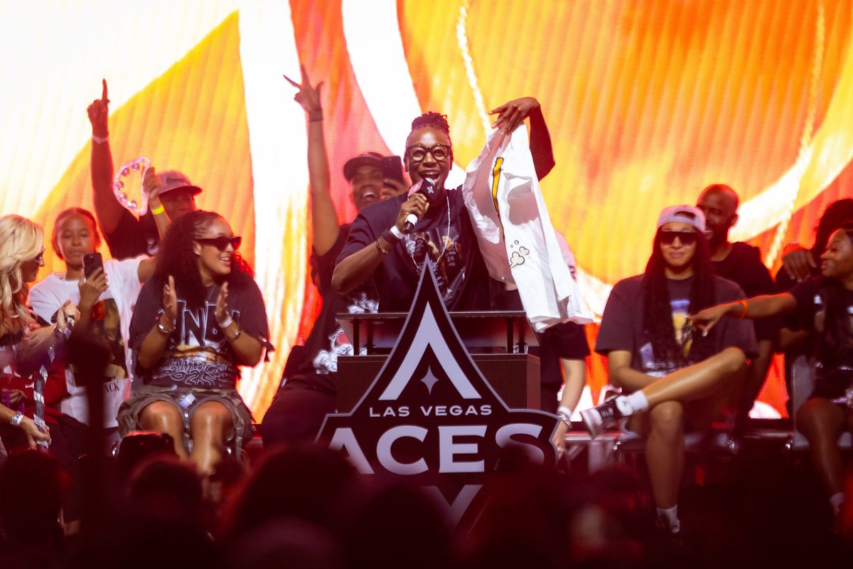 Las Vegas Aces guard Jewell Loyd speaks to the fans on stage during the Aces’ championship parade celebration, Friday October 17, 2025 in Las Vegas, Nev. Las Vegas Aces guard Jewell Loyd speaks to the fans on stage during the Aces’ championship parade celebration, Friday October 17, 2025 in Las Vegas, Nev.