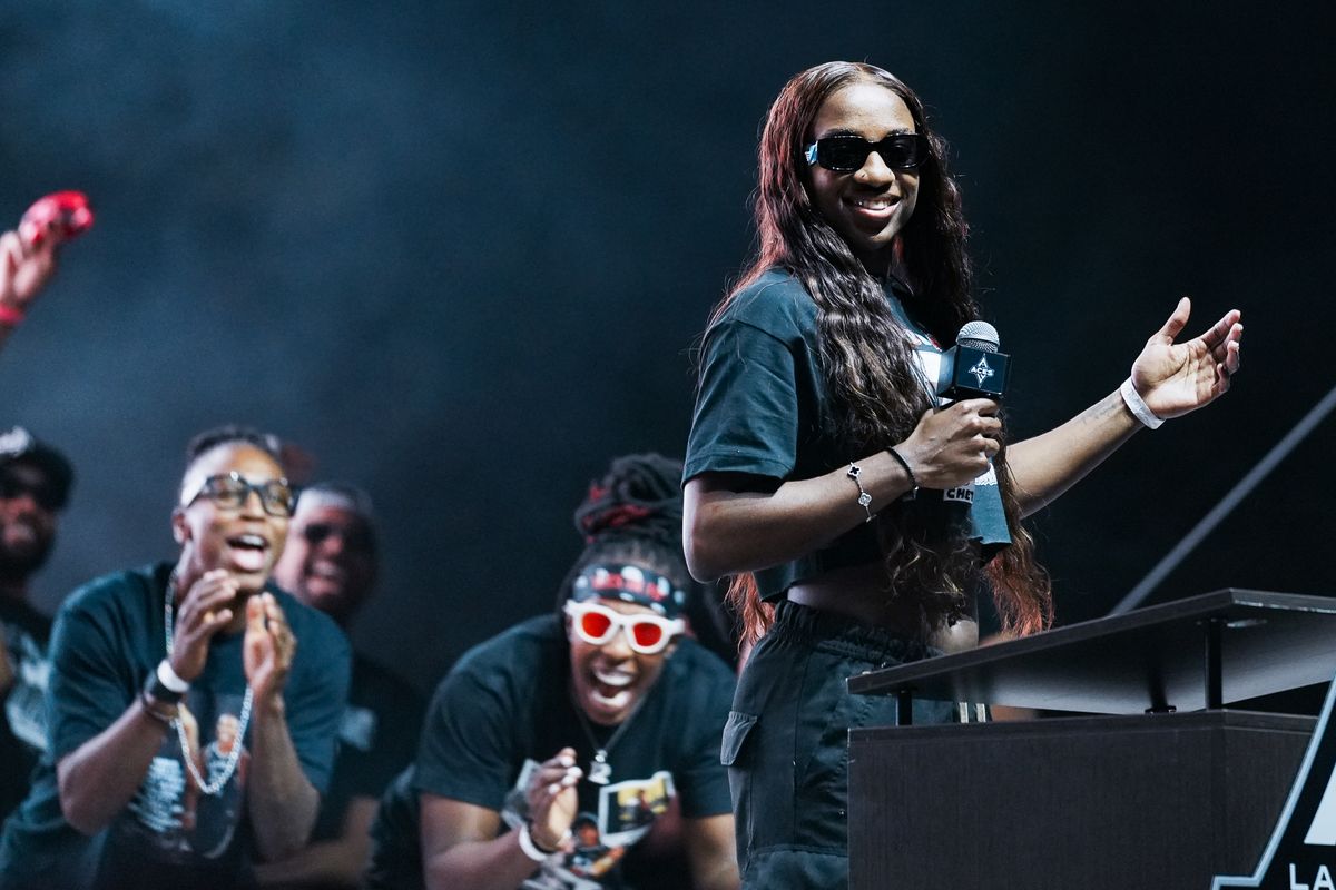 Las Vegas Aces guard Jackie Young speaks to the fans on stage during the Aces’ championship parade celebration, Friday October 17, 2025 in Las Vegas, Nev. Las Vegas Aces guard Jackie Young speaks to the fans on stage during the Aces’ championship parade celebration, Friday October 17, 2025 in Las Vegas, Nev.