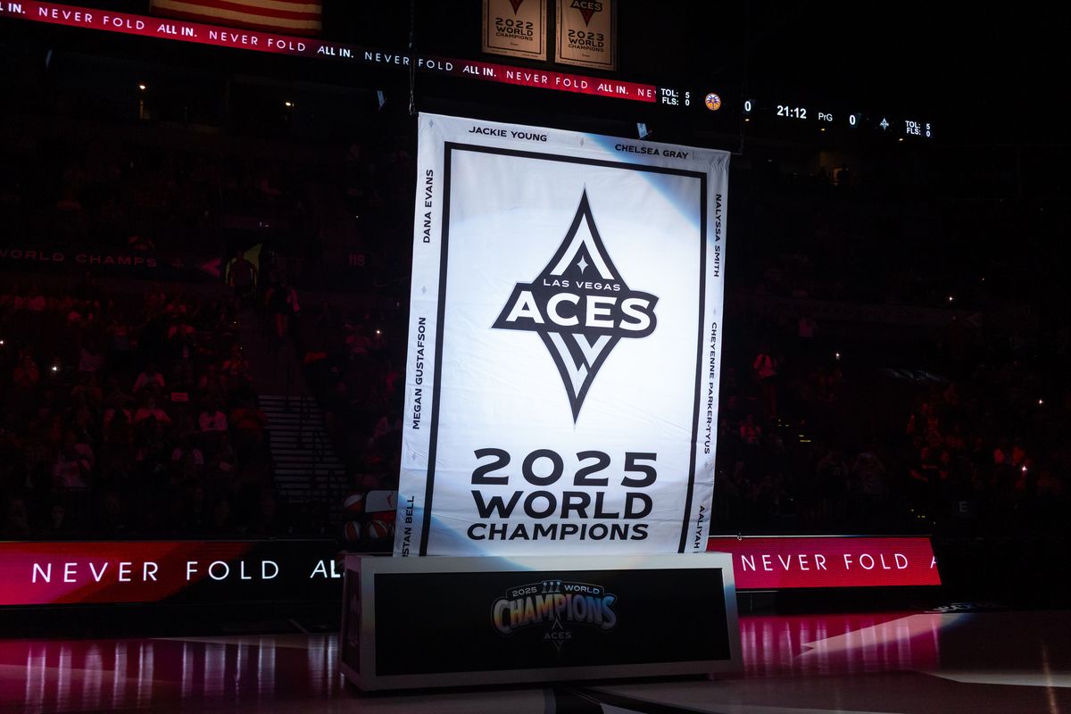 Las Vegas Aces 2025 Championship banner is raised before a WNBA game between the Las Vegas Aces and the Los Angeles Sparks, Saturday May 23, 2026 in Las Vegas, Nev.