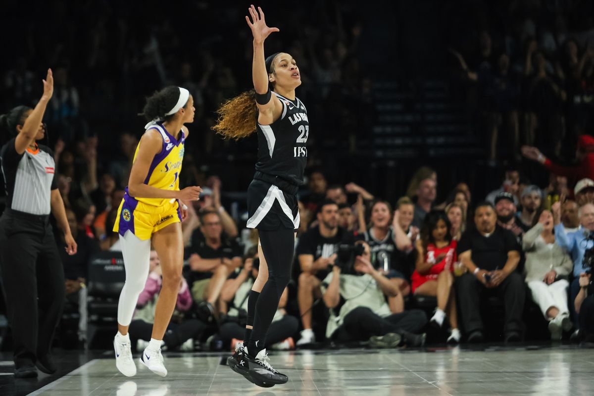 Las Vegas Aces guard Chennedy Carter (23) celebrates after scoring a three-point shot during a WNBA game between the Las Vegas Aces and the Los Angeles Sparks, Saturday May 23, 2026 in Las Vegas, Nev.