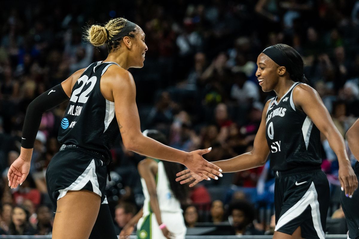 Las Vegas Aces forward A’ja Wilson (22) and guard Jackie Young (0) high-five one another during a WNBA game between the Las Vegas Aces and the Seattle Storm, Monday June 8, 2026 in Las Vegas, Nev. Las Vegas Aces forward A’ja Wilson (22) and guard Jackie Young (0) high-five one another during a WNBA game between the Las Vegas Aces and the Seattle Storm, Monday June 8, 2026 in Las Vegas, Nev.