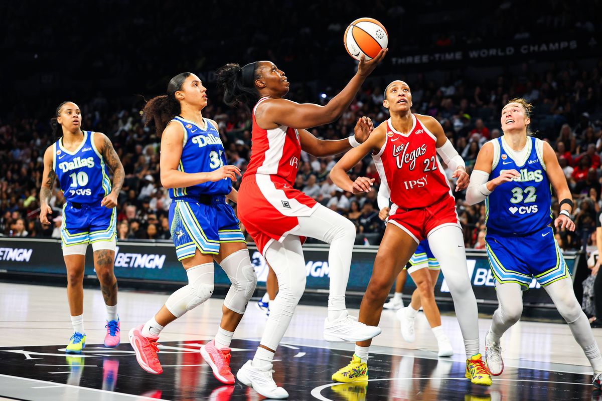 Las Vegas Aces guard Chelsea Gray (12) attempts a layup shot against the Dallas Wings on Thursday, June 25, 2026, at Michelob ULTRA Arena in Las Vegas, Nevada.