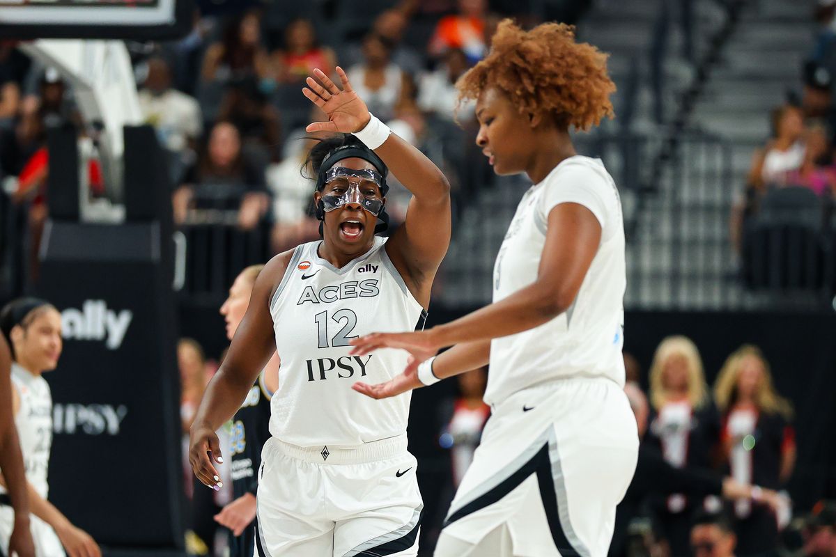 Las Vegas Aces guard Chelsea Gray (12) motions to high-five her teammate forward Nalyssa Smith (3) after a basket was scored by Smith against the Chicago Sky on Friday, July 3, 2026, at T-Mobile Arena in Las Vegas, Nevada.