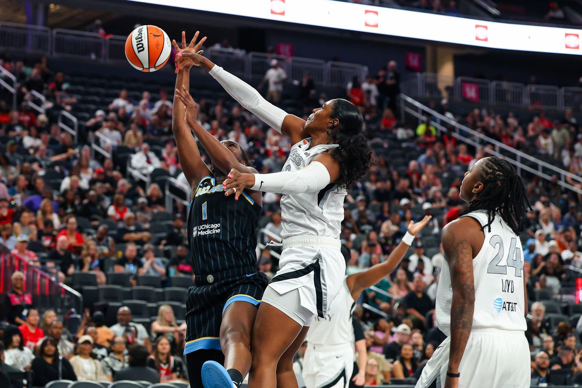 Las Vegas Aces forward Cheyenne Parker-Tyus (32) blocks a shot from Chicago Sky center Elizabeth Williams (1) on Friday, July 3, 2026, at T-Mobile Arena in Las Vegas, Nevada.