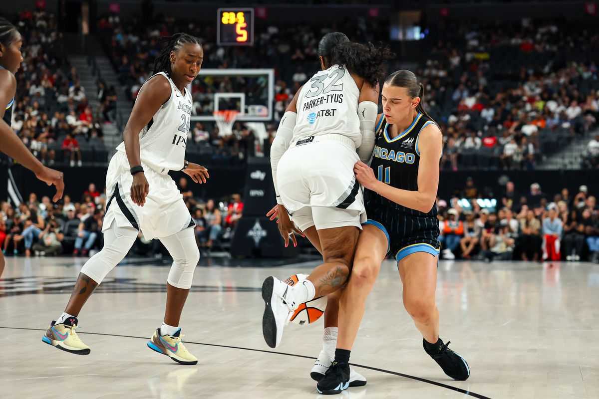 Las Vegas Aces forward Cheyenne Parker-Tyus (32) draws a foul from Chicago Sky guard Gabriela Jaquez (11) on Friday, July 3, 2026, at T-Mobile Arena in Las Vegas, Nevada.