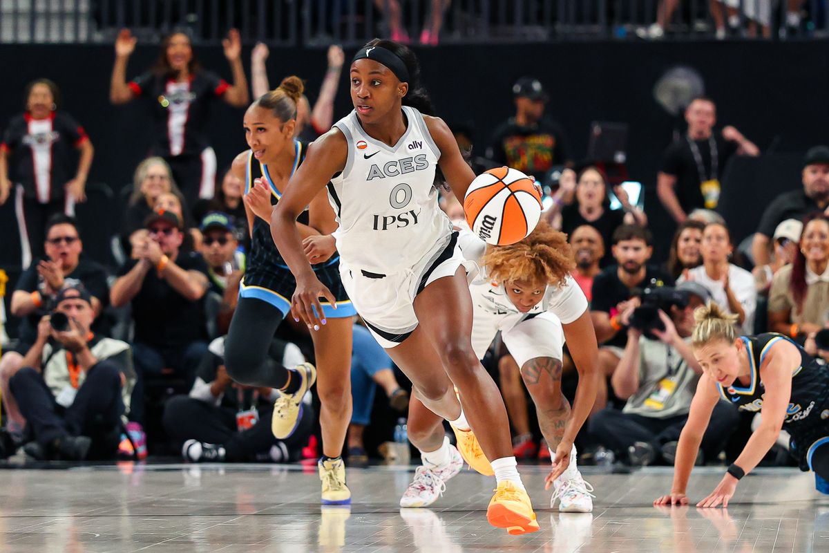 Las Vegas Aces guard Jackie Young (0) drives up the court during a WNBA game against the Chicago Sky on Friday, July 3, 2026, at T-Mobile Arena in Las Vegas, Nevada.