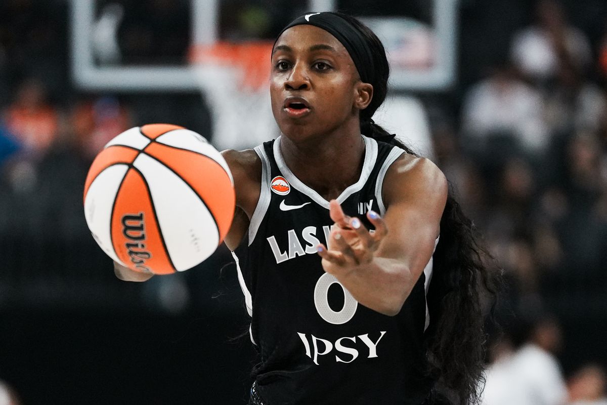 Las Vegas Aces guard Jackie Young (0) passes the ball to an awaiting teammate during WNBA game against Indiana Fever on Sunday July 5, 2026 at T-Mobile Arena in Las Vegas. Las Vegas Aces guard Jackie Young (0) passes the ball to an awaiting teammate during WNBA game against Indiana Fever on Sunday July 5, 2026 at T-Mobile Arena in Las Vegas.