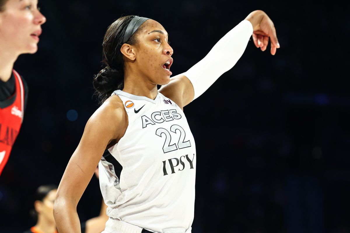 Las Vegas Aces center A’ja Wilson (22) follows through on her three-point basket against the Portland Fire on Tuesday, July 28, 2026, at Michelob ULTRA Arena in Las Vegas, Nevada.