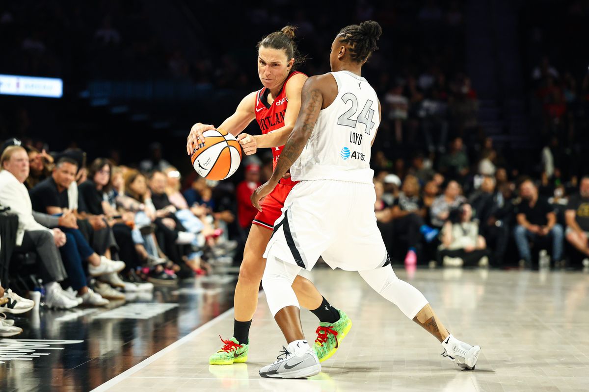 Portland Fire guard Teja Oblak (7) makes contact with Las Vegas Aces guard Jewell Loyd (24) during a WNBA game on Tuesday, July 28, 2026, at Michelob ULTRA Arena in Las Vegas, Nevada.
