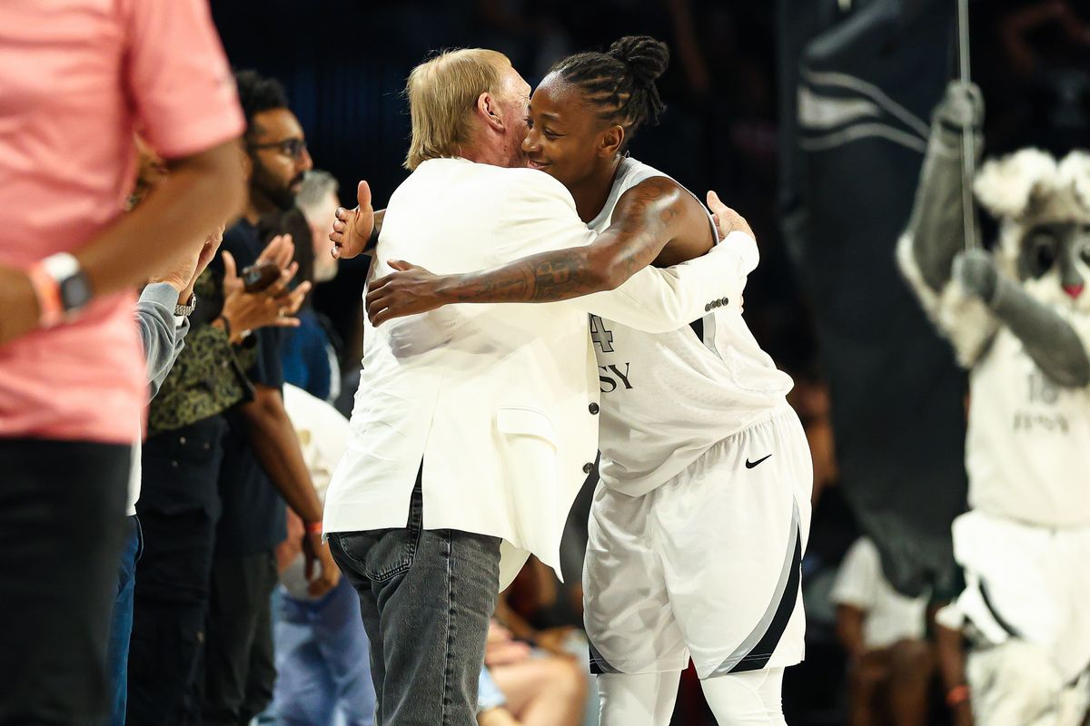 Las Vegas Aces guard Jewell Loyd (24) embraces team owner Mark Davis after defeating the Portland Fire on Tuesday, July 28, 2026, at Michelob ULTRA Arena in Las Vegas, Nevada.