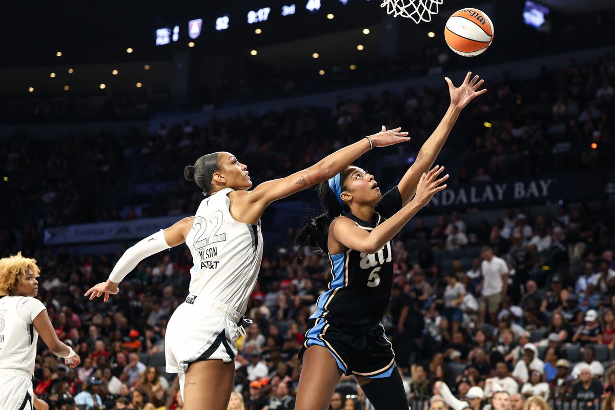 Atlanta Dream forward Angel Reese (5) floats a shot in past Las Vegas Aces center A'ja Wilson (22) during a WNBA game on Tuesday, August 18, 2026, at Michelob ULTRA Arena in Las Vegas, Nevada. Atlanta Dream forward Angel Reese (5) floats a shot in past Las Vegas Aces center A'ja Wilson (22) during a WNBA game on Tuesday, August 18, 2026, at Michelob ULTRA Arena in Las Vegas, Nevada.