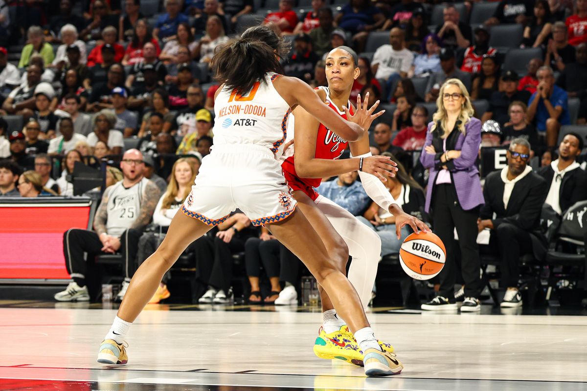 Las Vegas Aces center A'ja Wilson (22) looks for an open pass guarded by Connecticut Sun center Olivia Nelson-Ododa (10) on Thursday, August 20, 2026, at Michelob ULTRA Arena in Las Vegas, Nevada. Las Vegas Aces center A'ja Wilson (22) looks for an open pass guarded by Connecticut Sun center Olivia Nelson-Ododa (10) on Thursday, August 20, 2026, at Michelob ULTRA Arena in Las Vegas, Nevada.
