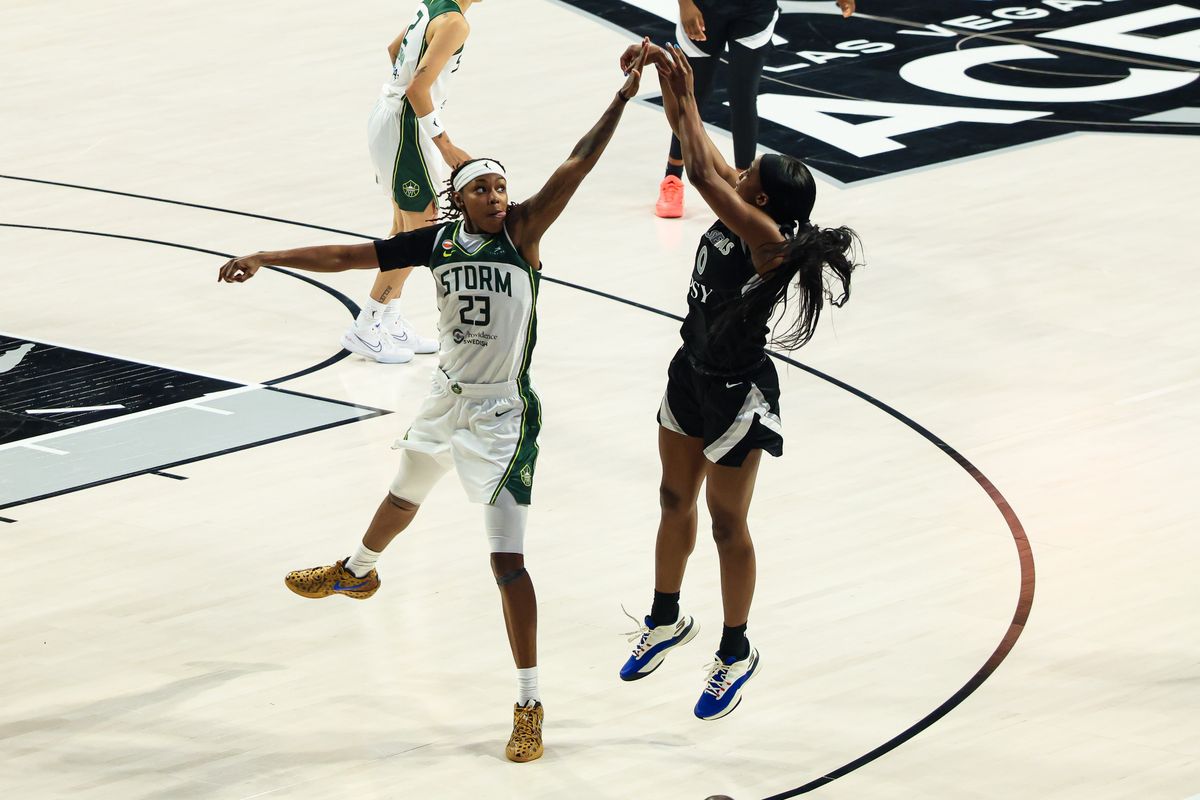 Las Vegas Aces guard Jackie Young (0) shoots a three-point basket guarded by Seattle Storm forward Jordan Horston (23) in the third quarter of the WNBA game on Sunday, September 20, 2026, at Michelob ULTRA Arena in Las Vegas, Nevada. Las Vegas Aces guard Jackie Young (0) shoots a three-point basket guarded by Seattle Storm forward Jordan Horston (23) in the third quarter of the WNBA game on Sunday, September 20, 2026, at Michelob ULTRA Arena in Las Vegas, Nevada.